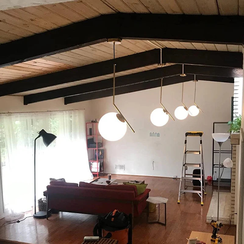 Suspension moderne boule lumineuse tige pliée en laiton 1 ( à split)