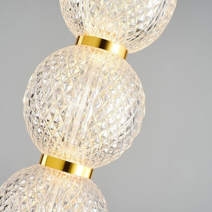 Suspension transparente dorée guirlande boule art déco