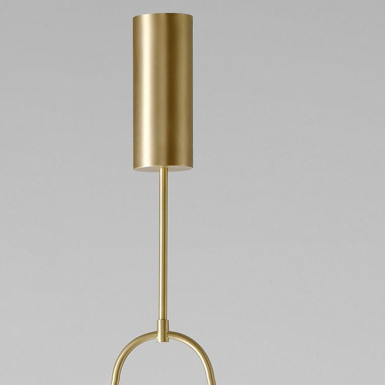 Suspension longue en laiton design moderne