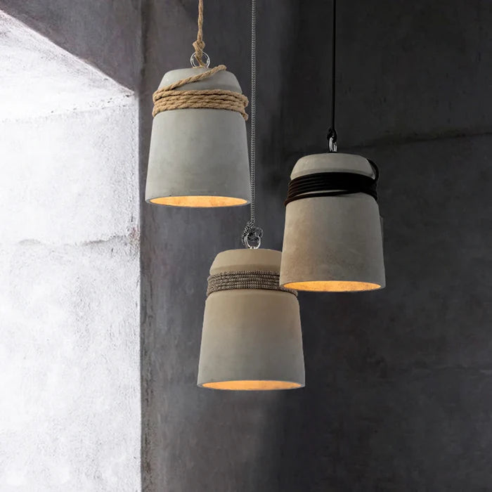 Suspension cloche ciment et corde design scandinave
