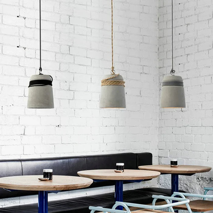 Suspension cloche ciment et corde design scandinave