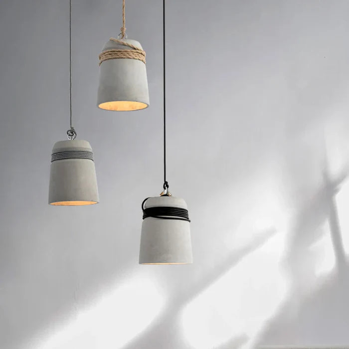 Suspension cloche ciment et corde design scandinave