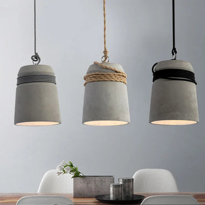 Suspension cloche ciment et corde design scandinave