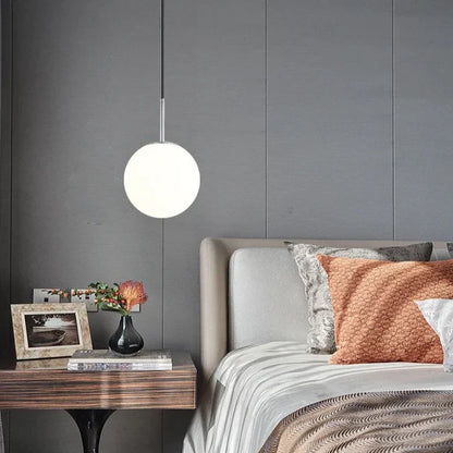 Suspension moderne boule lumineuse tige en laiton