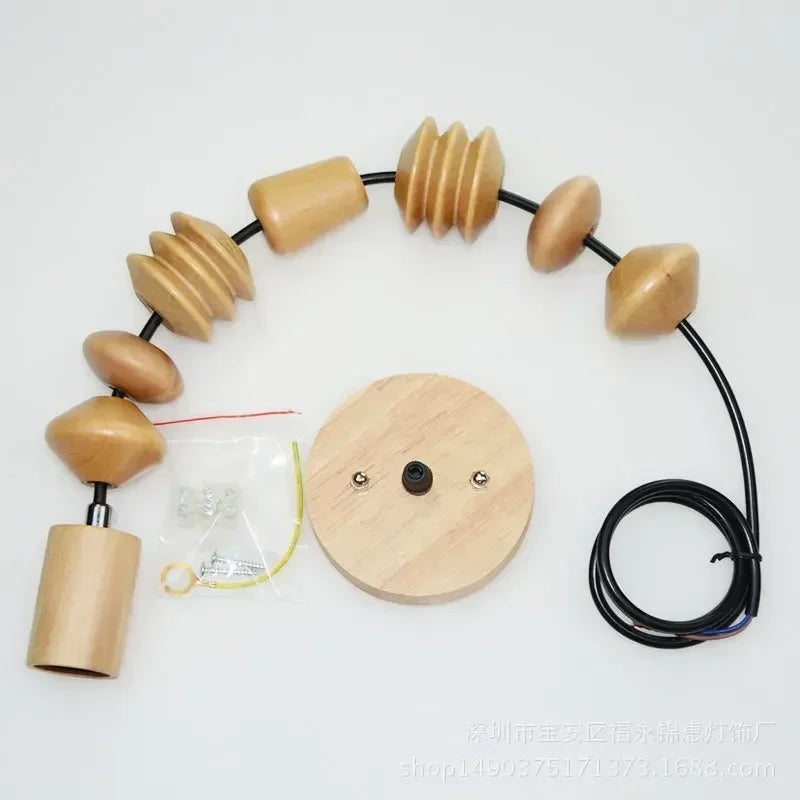 Suspension bois scandinave perles formes géométriques