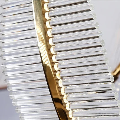 Suspension plume transparente et dorée design moderne