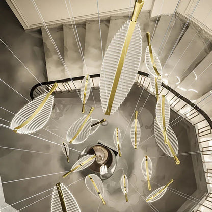 Suspension plume transparente et dorée design moderne
