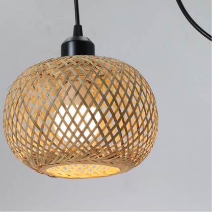 Suspension boule ajourée rotin et bambou style scandinave