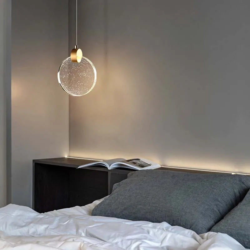 Suspension ronde cristal transparent métal doré