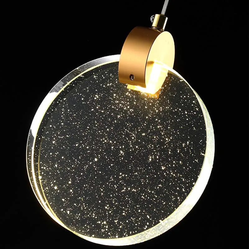 Suspension ronde cristal transparent métal doré