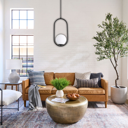 Suspension moderne boule lumineuse ovale en laiton
