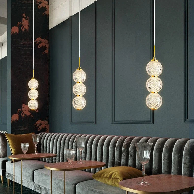 Suspension transparente dorée guirlande boule art déco