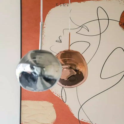 Suspension verre globe asymétrique nacré design